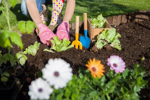 Gardeners Brent Cross using safe procedures during outdoor maintenance
